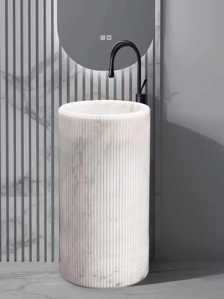 

Modern light luxury natural marble column basin integrated floor art wash basin Nordic style