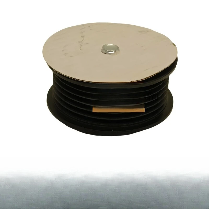 Tensioning wheel generator idler with groove