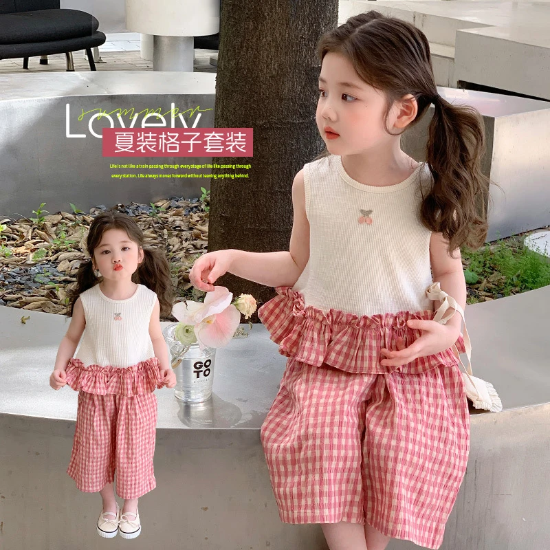 

Girls' summer outfit2026New stylish and fashionable children's summer outfit, baby vest and plaid pants thin two-piece set
