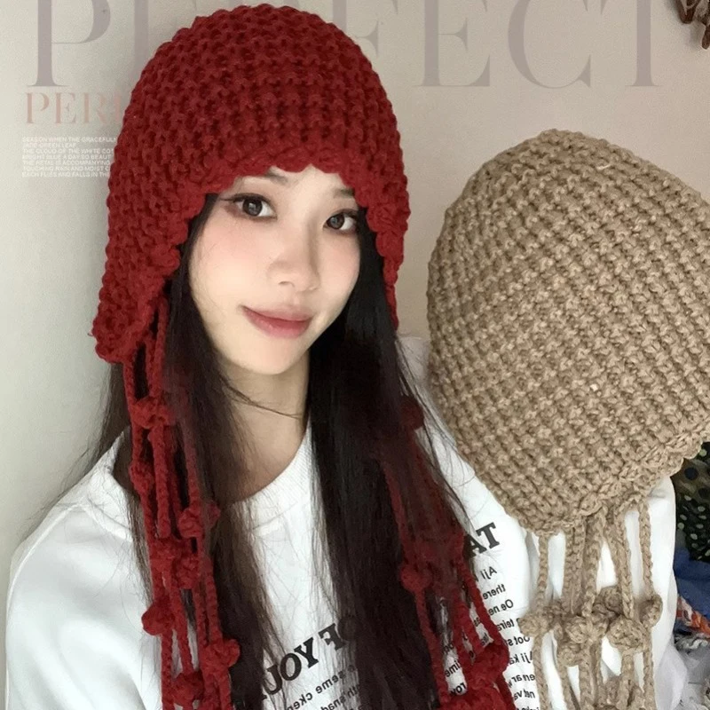 

Hand Woven Tassel Knitted Hat for Women Autumn Winter Hollow Out Design Ear Protection Lei Feng Hat