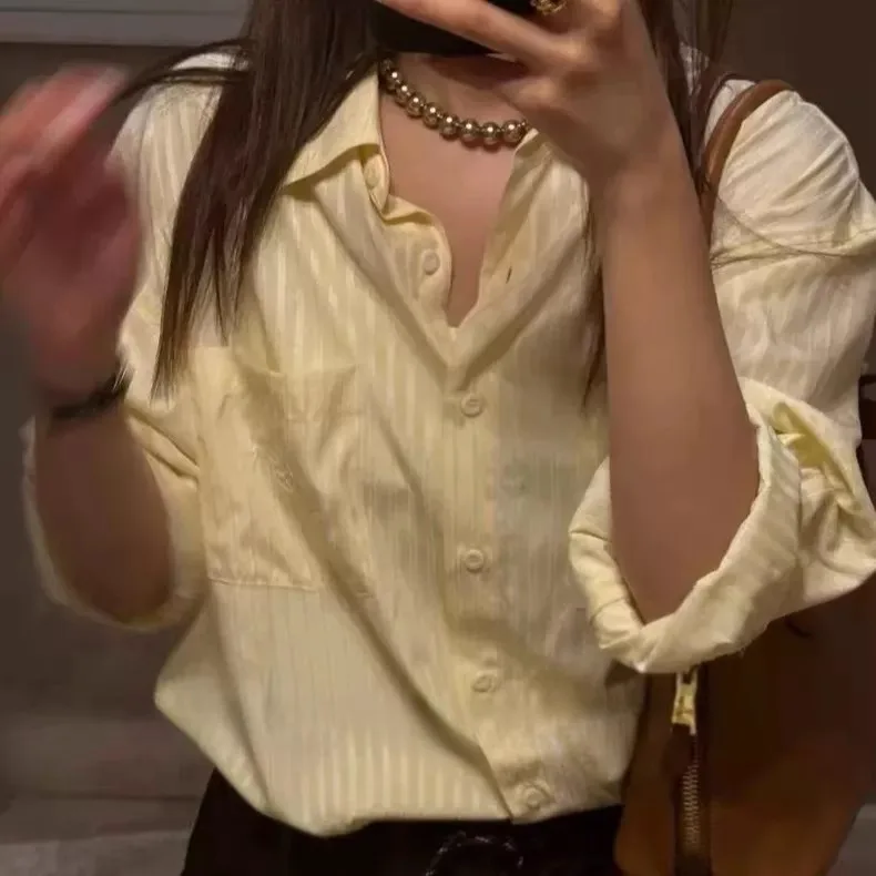 ゆったりとしたロングスリーブの女性用快適で通気性のあるスリムフィットの縦縞柄のゆったりとしたトップス、ファッショナブルなカジュアルウェア