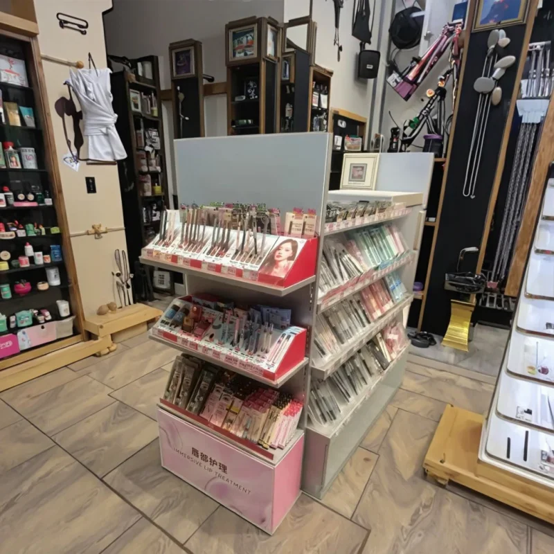 custom.Customized Modern Cosmetic Beauty Store Display Rack Portable Foldable Rotating Metal Stand