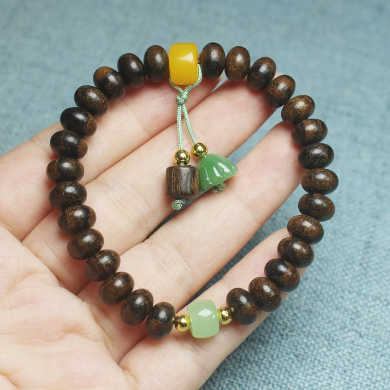 Tiger stripe agarwood abacus bead bracelet with small lotus pendant and Buddhist prayer beads - view 2