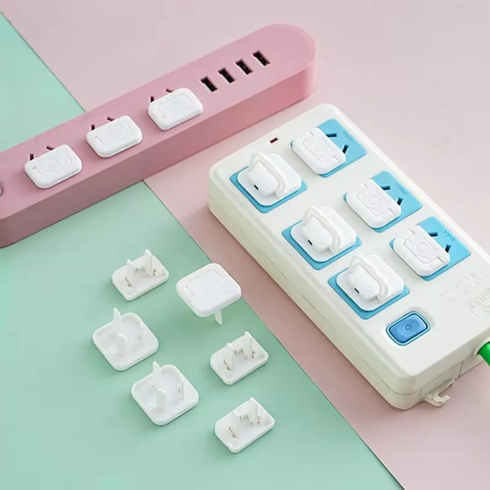 

50 шт., однотонная защитная крышка от поражения электрическим током, предохранительный замок с двумя отверстиями, дизайн, защита от электрической вилки