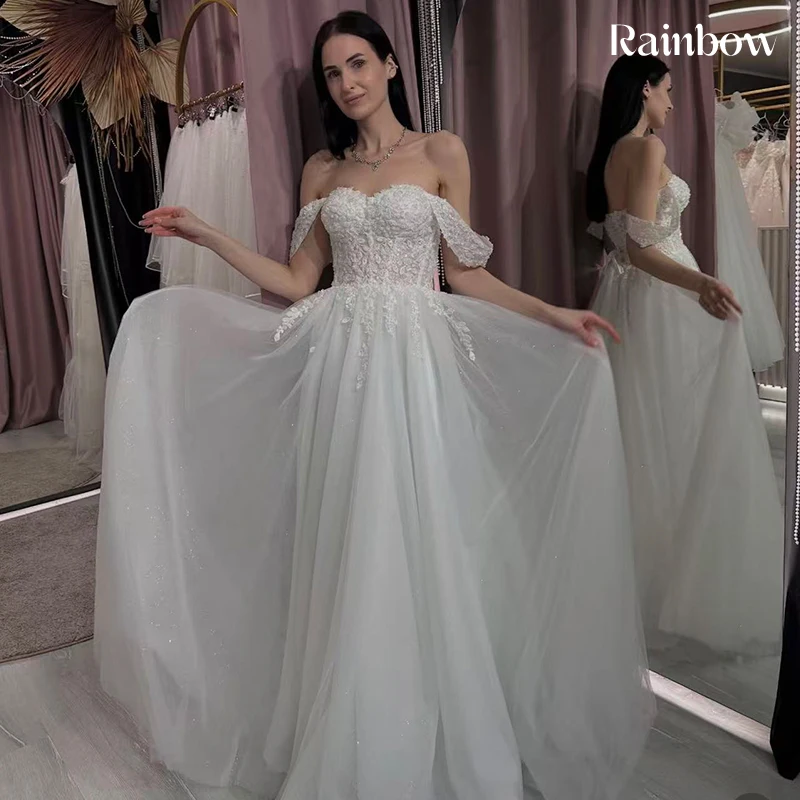 فستان زفاف مكشوف الكتفين من الأورجانزا مع تطريز على شكل حرف a بطول الأرض فستان زفاف مخصص برباط فيستدو دي نوفيا ترتر