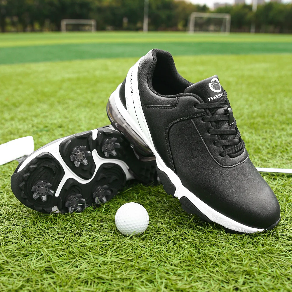 Sapatos esportivos de golfe profissional para homens, tênis de golfe atlético, picos de couro, tênis de treinamento de golfe preto e branco, tamanho grande 39-48