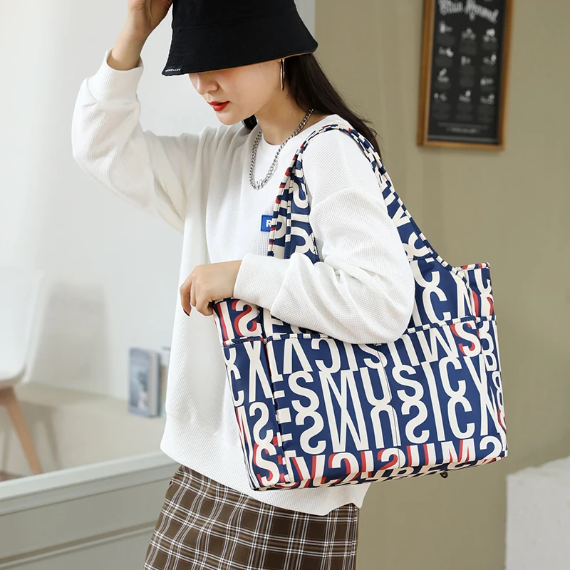 

2025 New Nylon Printed Handbag Large Capacity Ethnic Style Casual Shopping Bag Fashion Travel Bag Tote Bag