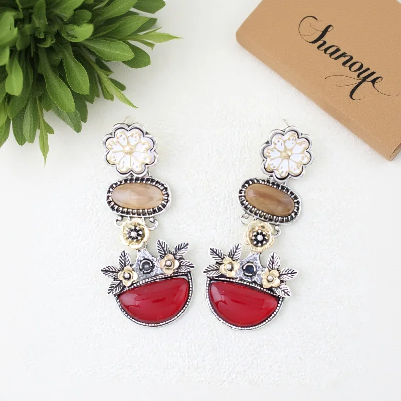 Vintage bohemian resort style gold and silver color-blocked floral earrings, travel jewelry