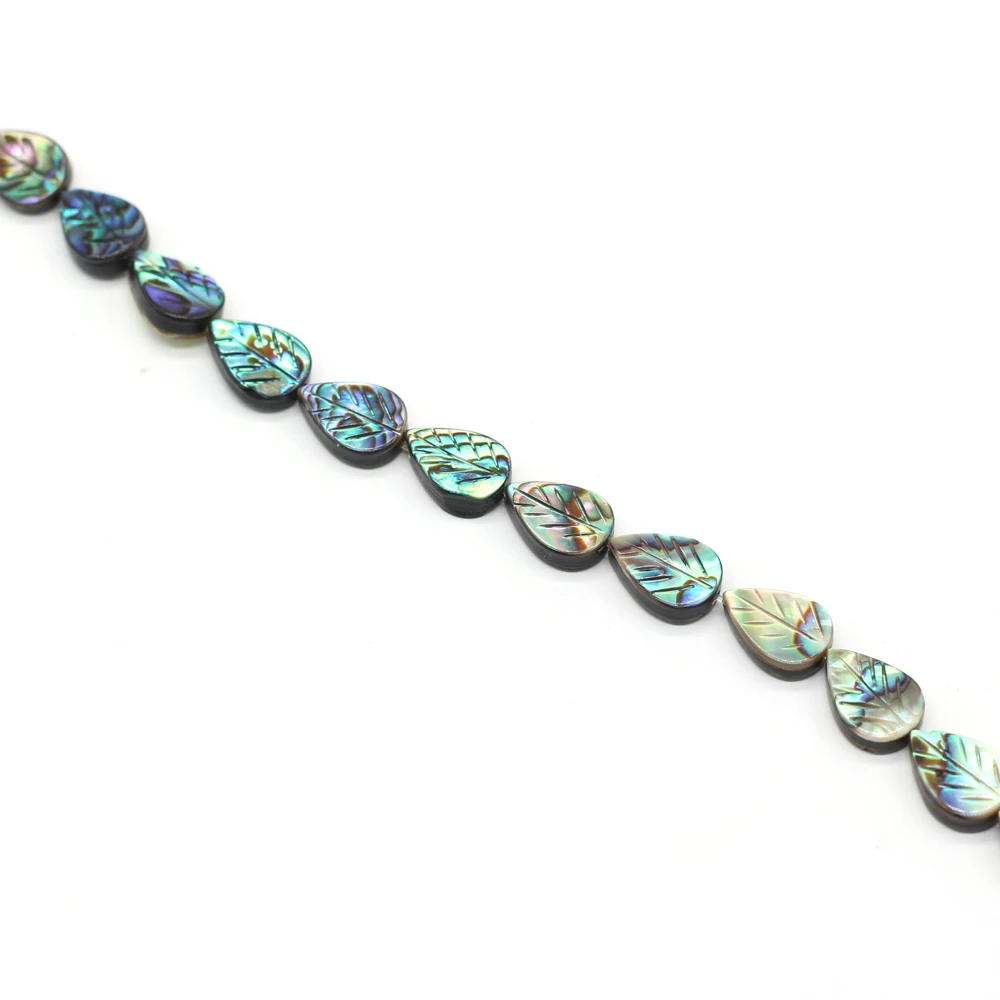 33 Stück/Strang, blattförmige Perlen aus Abalone-Muschel, 8 x 12 mm, zum Basteln von Schmuck, für DIY-Halsketten, Armbänder, Ketten und Ohrringe. – Detail 3