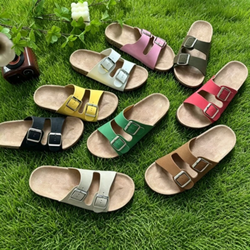

2026 Fashion Women's Slipper Sandals, casual style, perfect for beach wear, made of cork material with a double buckle design.