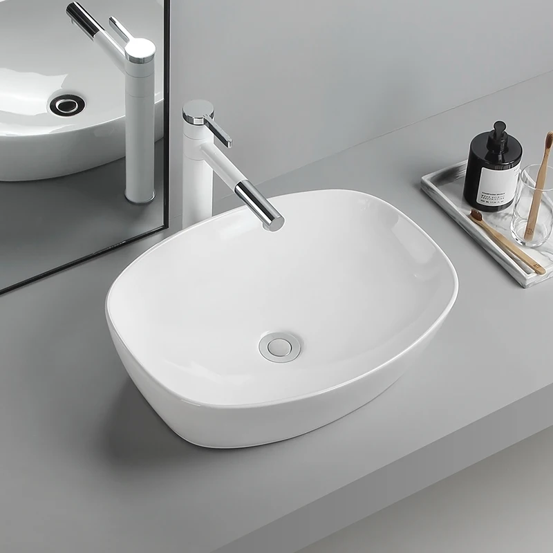 

Elegant Ceramic Vessel Sink, Oval Design Ceramic Wash Basin - Ideal for Modern Bathroom Fixtures, Suitable for Dressing Rooms, Vanities, Bathrooms