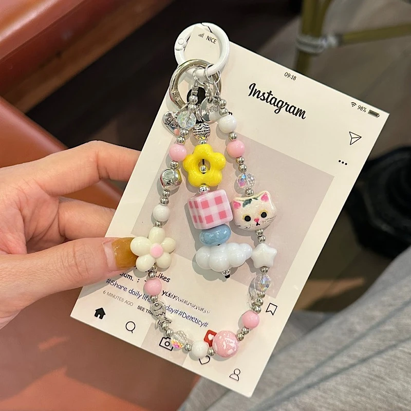 

Декоративный брелок-подвеска «Дофаминовая любовь» с жемчужным цветком для телефона, сумки, ключей, AirPods, чехлов для наушников и ключей от машины