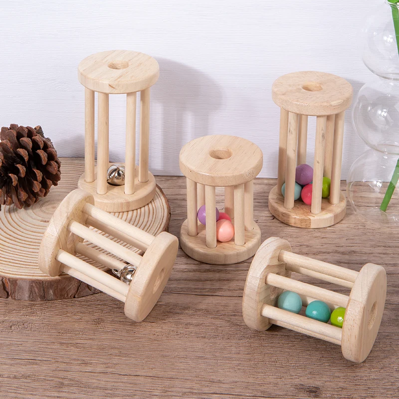 Wooden rattle toy with colorful balls and metal bells in various combinations—perfect for babies to grasp and shake for endless