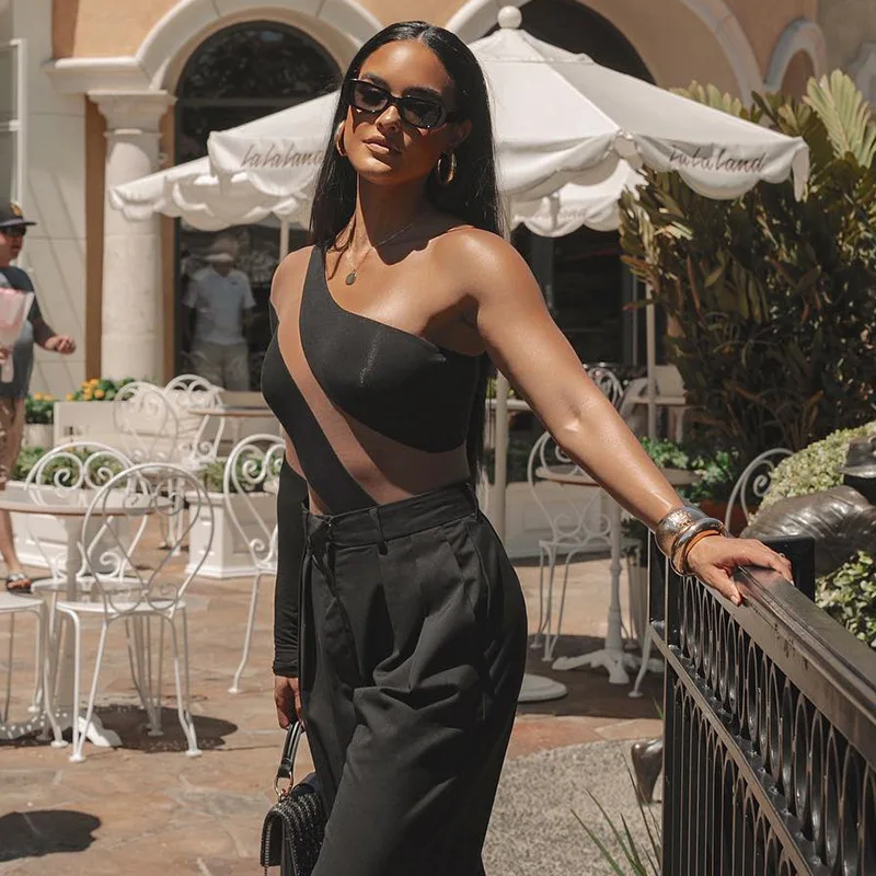 ชุดกระชับสัดส่วนแขนยาวยืดหยุ่นสูงสำหรับผู้หญิง แฟชั่นขายดี เซ็กซี่ สาวฮอต ตัดต่อผ้าซีทรูรัดรูป บอดี้สูท ฤดูใบไม้ร่วง