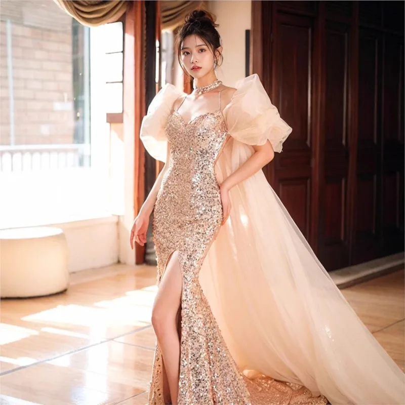 

Champagne gold fishtail slit sequencer host toasting drag dress