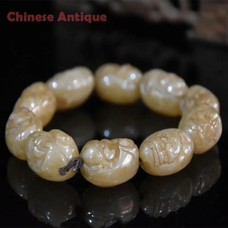 China Antique Hongshan Culture Kava Stone Old Man Exquisite Hand Carved Bracelet Statues et Sculptures Wristband