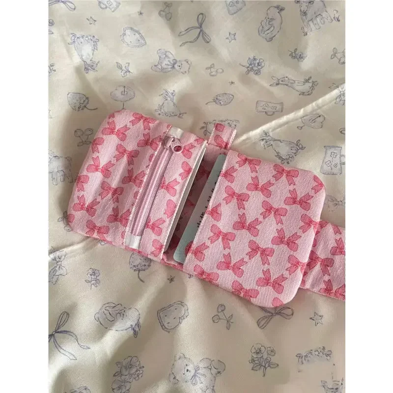 Portamonete rosa con stampa fiocco portamonete in tela con cerniera piccola porta carte di credito per ragazze borsa portaoggetti Casual per donna