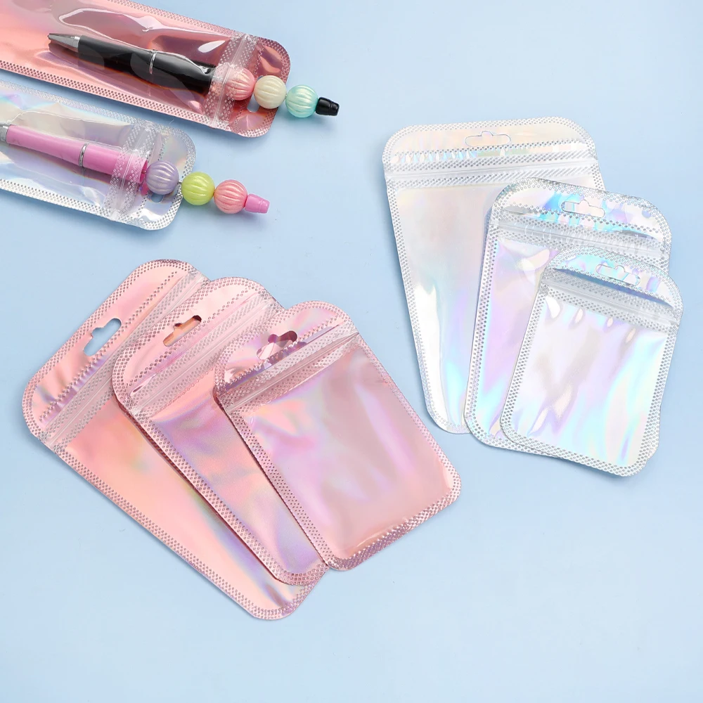 

50 шт. переливающиеся самозаклеивающиеся пакеты, розовые серебристые лазерные пластиковые пакеты с застежкой-зиппером, многоразовые пакеты для демонстрации ювелирных изделий