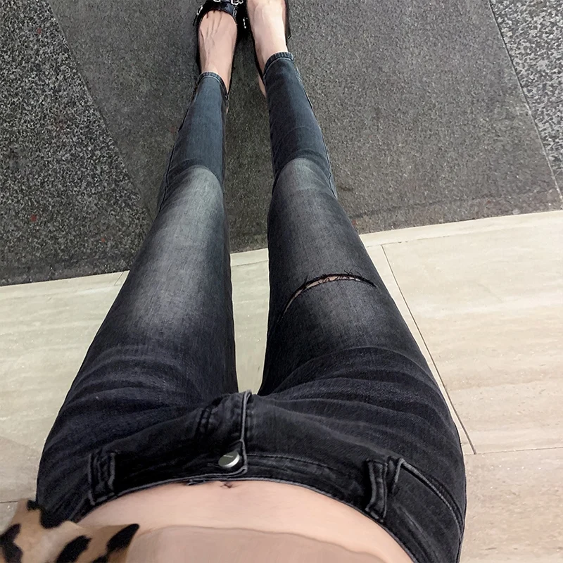 

High Waist Bla Skinny Denim Jeans Women's Sle Torn Hole Body ape Highlighting Nine Points Pants Korean Version