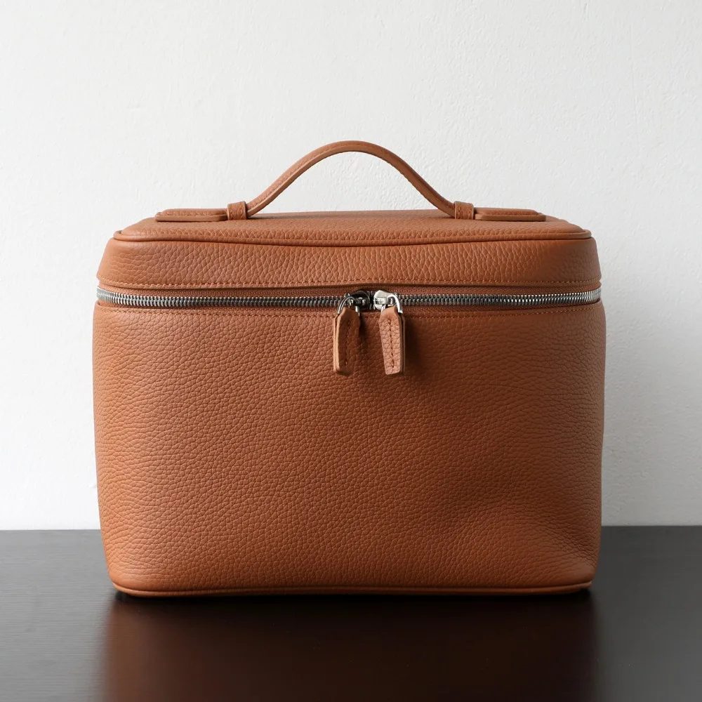 

Light Luxury Niche Fashionable Large Capacity First Layer Cowhide Portable Storage Toilet Bag Multi-grid Travel Cosmetic Case