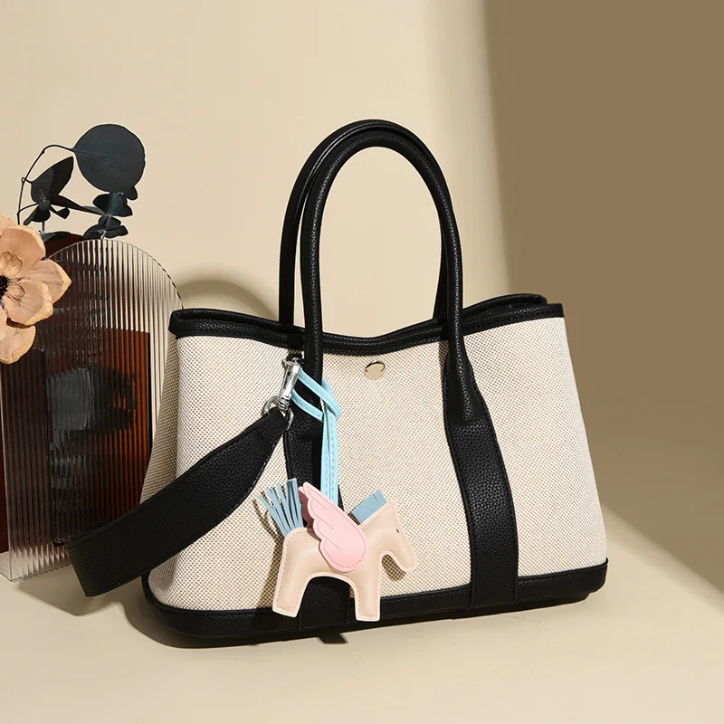 PU leather spliced color-blocking women's lightweight commuting crossbody bag, soft leather hand-held shoulder bag