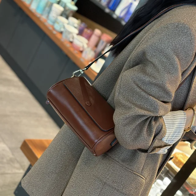 Wysokiej jakości cylindryczna torba torba z bydlęcej skóry dla kobiet 2023 nowa torba na ramię markowa torba Crossbody z prawdziwej skóry