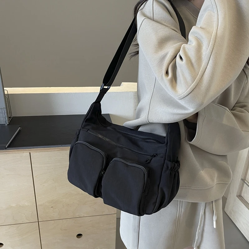 Bolso de hombro Simple para mujer, bolso de mano de lona de gran capacidad a la moda, bolso de viaje con correa ajustable, bolso de compras para mujer