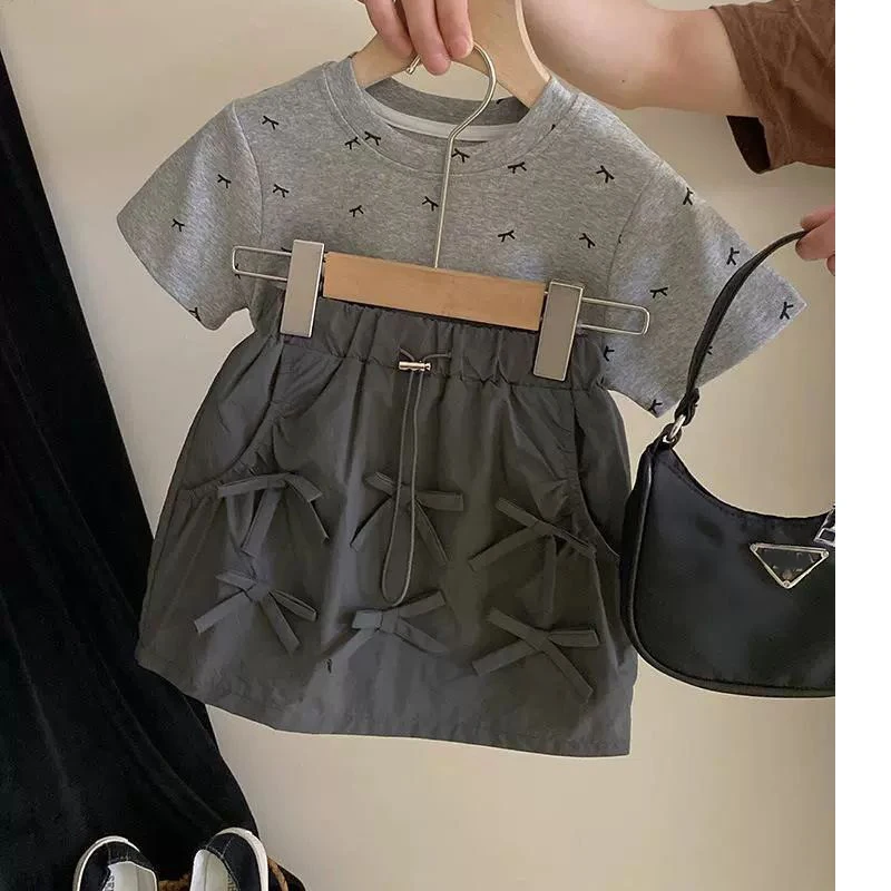 

Girls' Korean 2025 Version Bow Printed T-shirt Two-piece Set Simple Top Workwear Three-dimensional Bow Half Skirt Set