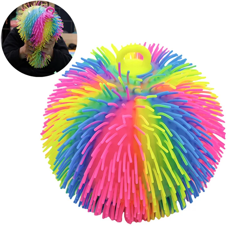 

Rainbow Sensory Puffer Ball – 22cm/8.5" Stress Relief Toy With Spiky Texture & Stretchy Strings