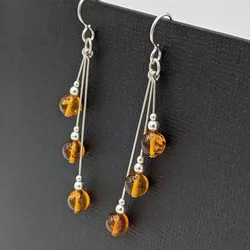 Amber earrings, asymmetrical pendant earrings, real amber jewelry