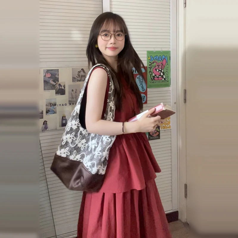 Vestido chaleco sin mangas rojo francés para mujer en verano 2025, nuevo conjunto de traje pequeño y de alta gama, falda larga