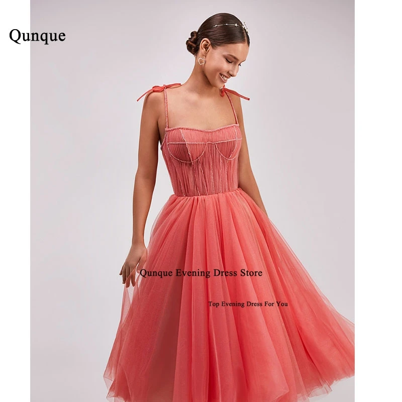 

Qunque Beadings Spaghetti Straps Prom Dress With Bows A-Line Sleeveless Party Dress With Pockets Long Tulle Formal Evening Gowns