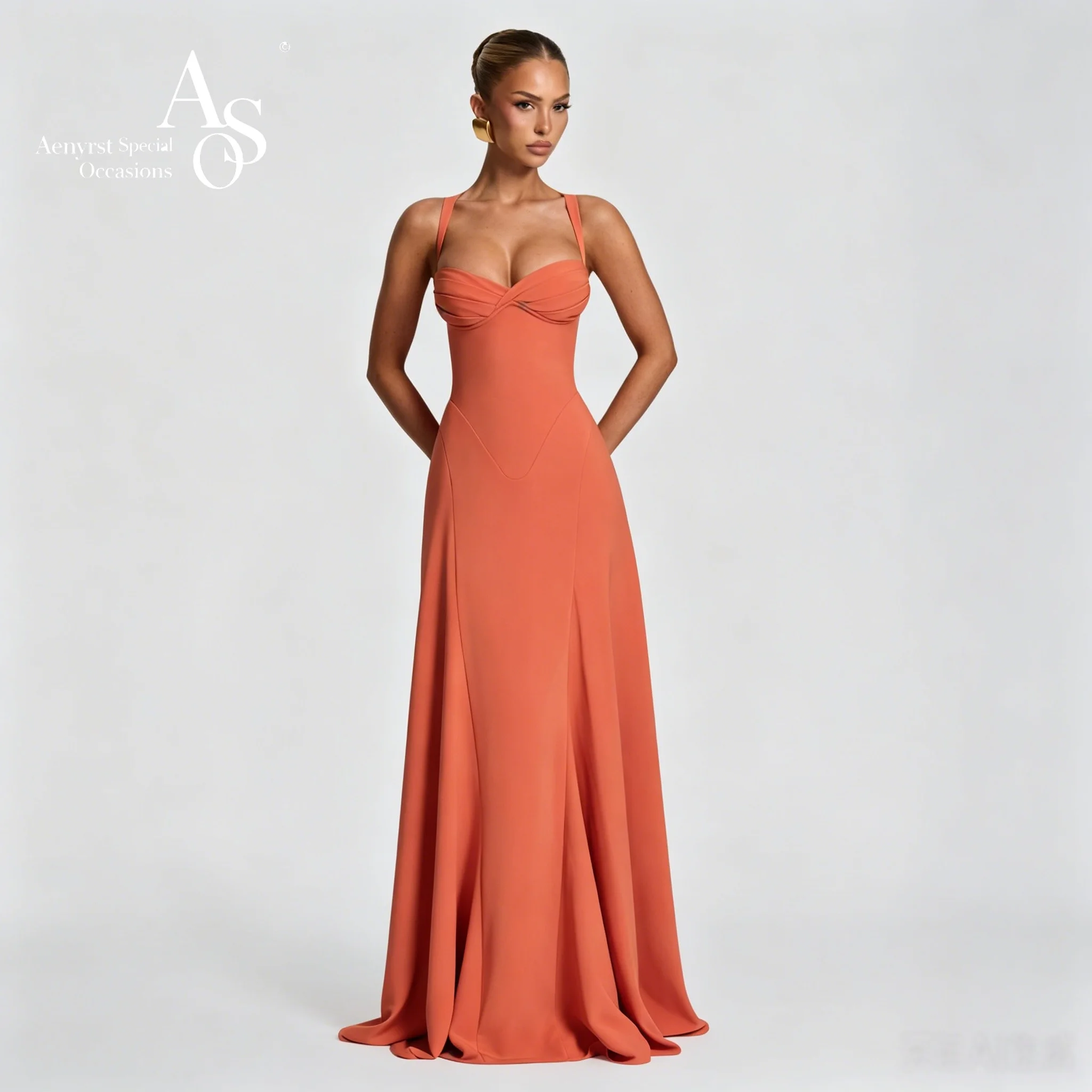 Orange floor-length formal gown featuring a strapless sleeveless bodice draped waist and flowing silhouette perfect for balls