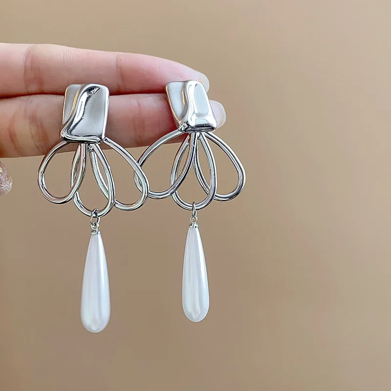 Pendientes con colgante de perlas de Metal irregulares, pendientes de tuerca de moda personalizados de estilo europeo y americano, accesorios de viaje para mujer