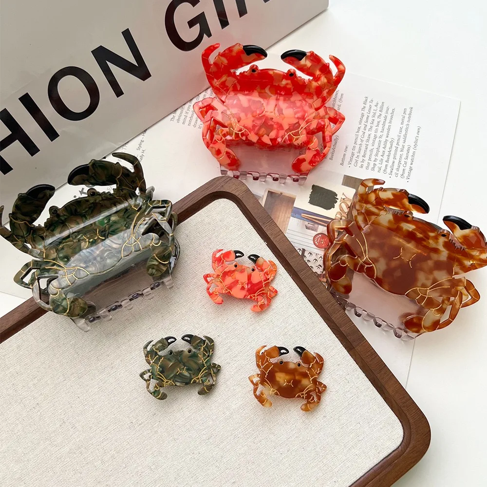 Крабовый коготь представляет собой нишевый и уникальный стиль летнего отдыха. Это изготовлен из высококачественного ацетатного материала, изготовленного вручную, с эмблемой.