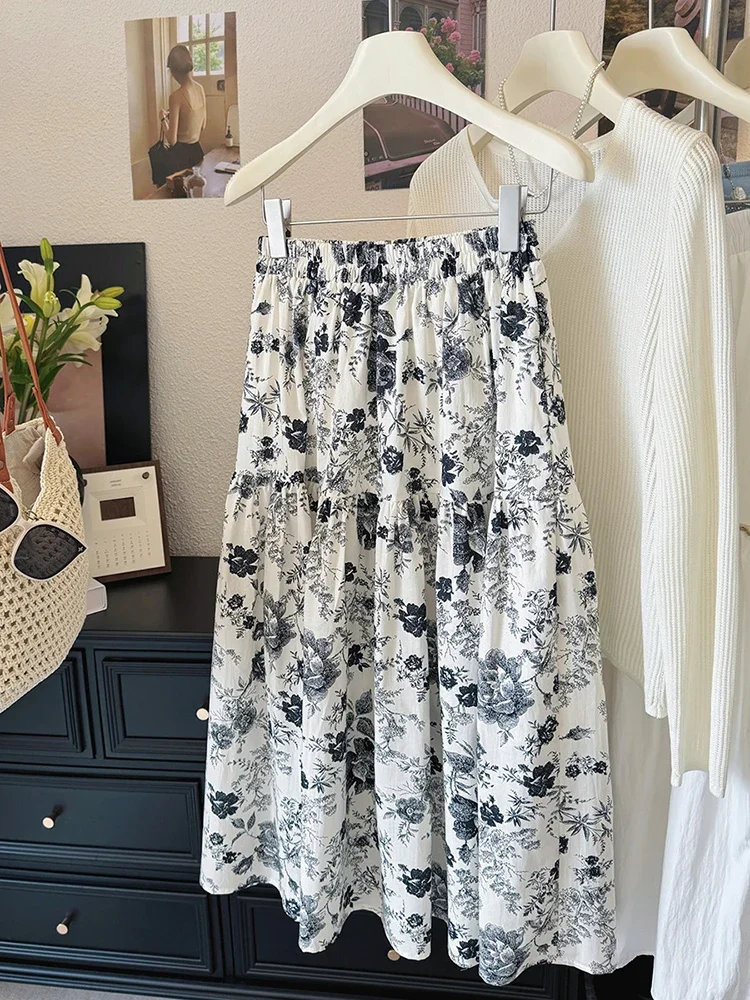 2025 verão novas saias de impressão floral feminino retro solto a linha saia casual versátil saias de cintura elástica