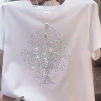 2025 Camisetas con estampado de diamantes y cuello redondo para mujer, novedad de verano, camisetas informales de manga corta holgadas de algodón liso a la moda para ir al trabajo