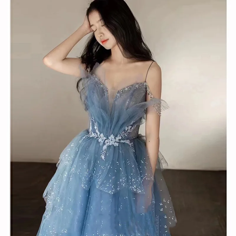 

Blue Spaghetti Strap Evening Dress Luxury Tulle Applique Princess Cake Gown Sexy Illusion Backless Long Quinceanera Dresses