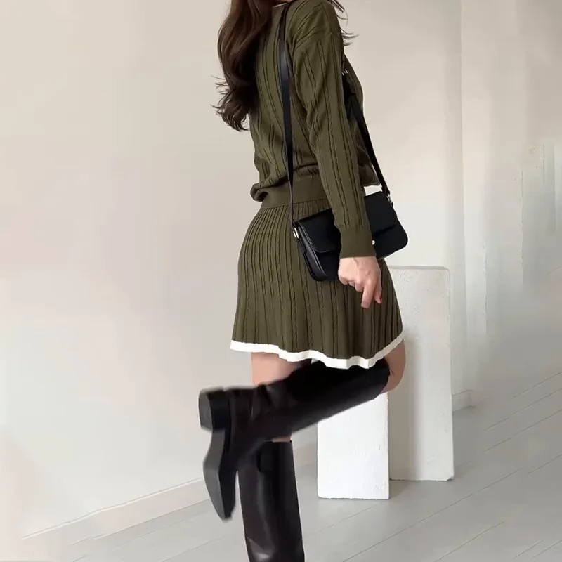 Ropa de mujer de comercio exterior europeo y americano otoño nuevo cuello POLO empalme Falda corta conjunto de suéter de punto de moda