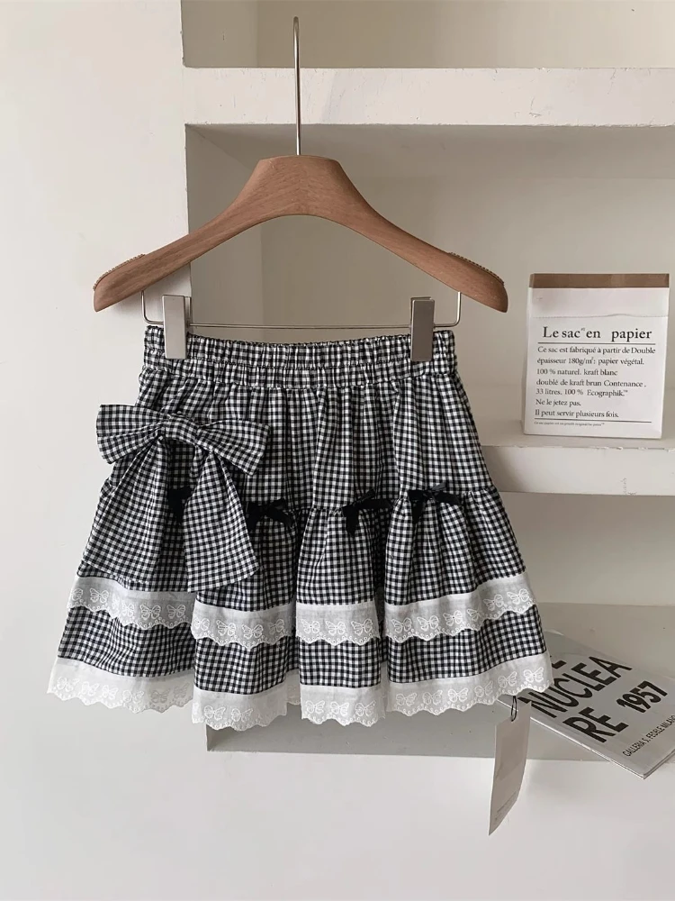 Japonais doux nœud dentelle épissage jupe à carreaux femmes été taille haute plissée couches gâteau gonflé Mini jupes Y2k Faldas