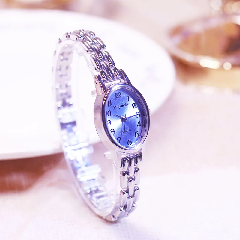 جديد عصري المرأة الفضة البيضاوي الفاخرة ساعة الموضة الإناث الفتيات طالب مكتب سيدة الساعات هدية عيد ميلاد الأم الساعات