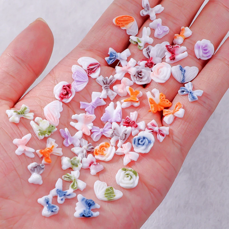 50 Stuks Keramisch-Achtige 3d Nail Art Decoratie Accessoires Onderdelen Strik Bloem Vlinder Bedels Lichtgevende Nagel Levert Materiaal