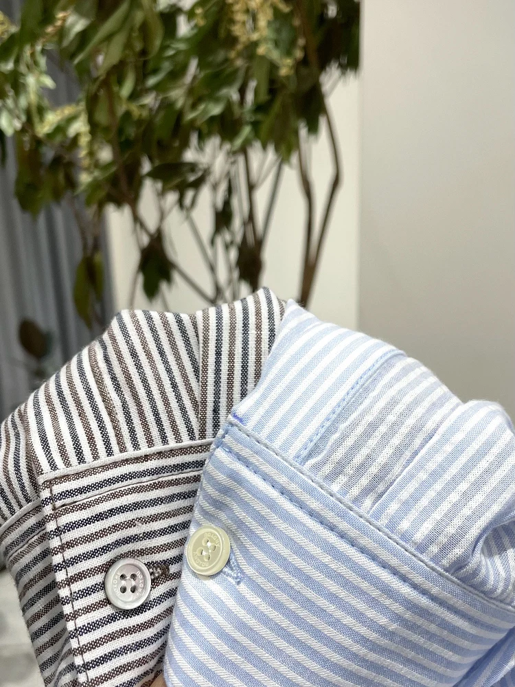 Nolara ربيع 2025 جديد فضفاض الملمس مخطط طويل Sve irt المرأة عادية Sle القطن الخالص مستقيم قطع طوق زر