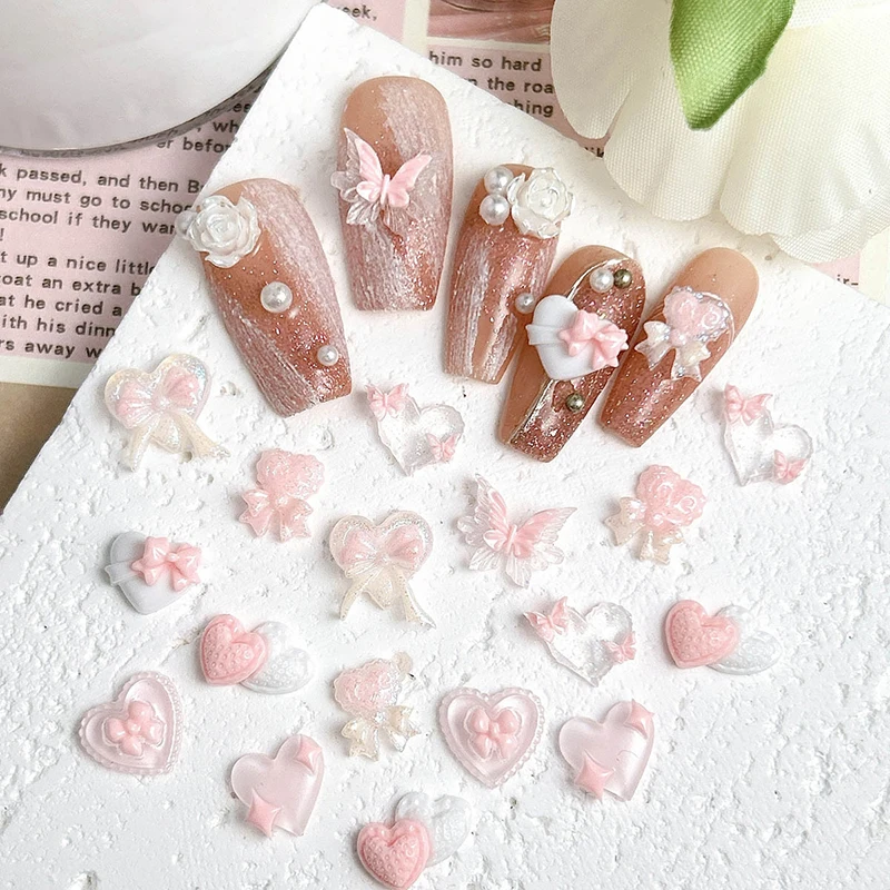 50 pièces papillon pêche coeur doux vent rose série arc coeur résine ongles breloques 3D lumineux Double Nail Art décorations bricolage ongles