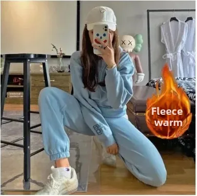 طقم رياضي نسائي سميك مبطن بالصوف فضفاض مناسب كاجوال مكون من قطعتين للخريف والشتاء على الطراز الكوري مريح