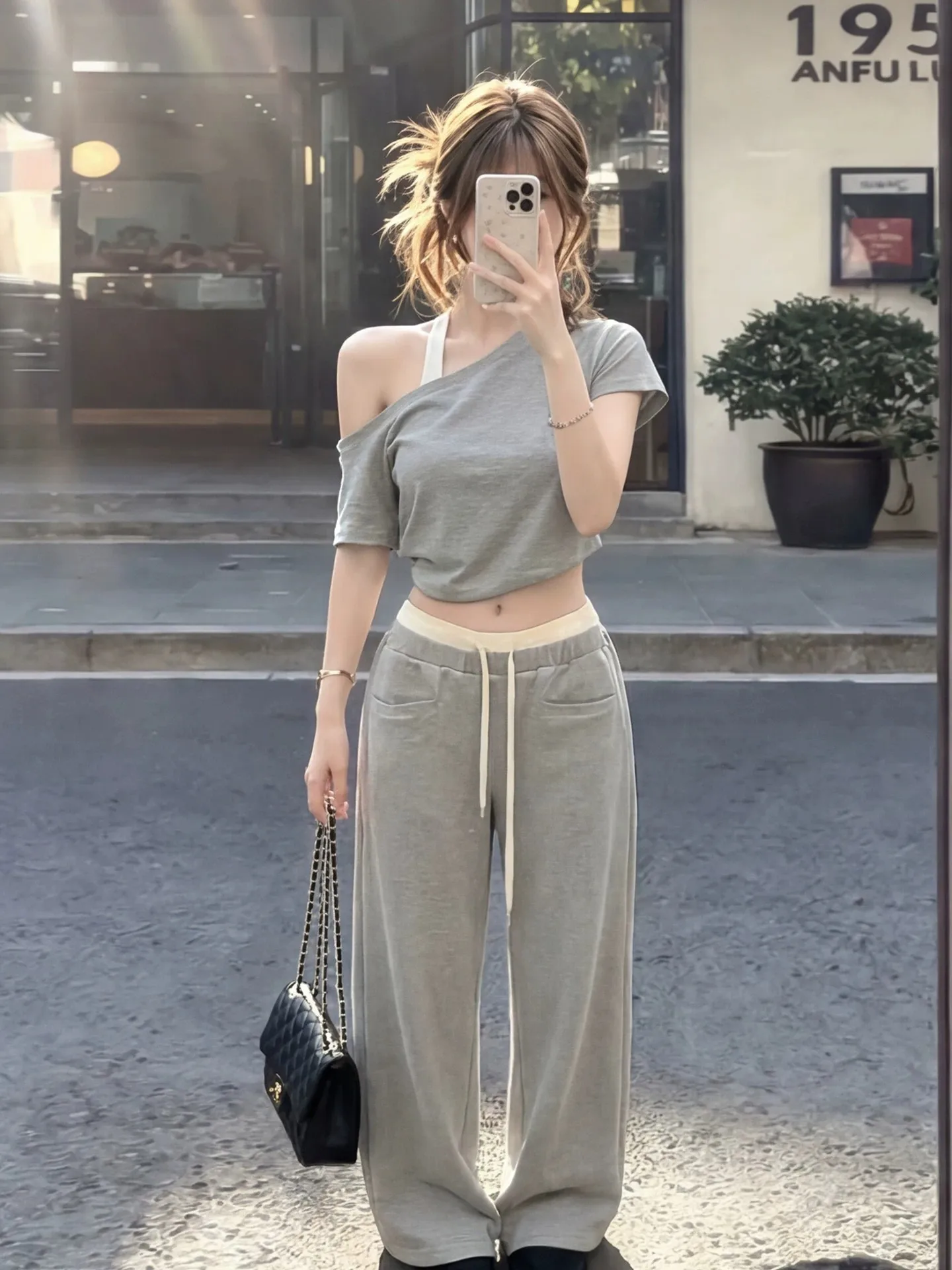 

Korean Style Casual Set Women Summer New Spicy Girl High-End Feel Asymmetrical Shoulder Short Sleeve Top Wide Leg Pants Two-P...