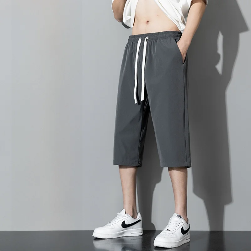 

Мужские повседневные брюки из ледяного шелка, свободного кроя, длиной 7/8, быстросохнущие, дышащие, модные, летние, для активного отдыха, молодежные