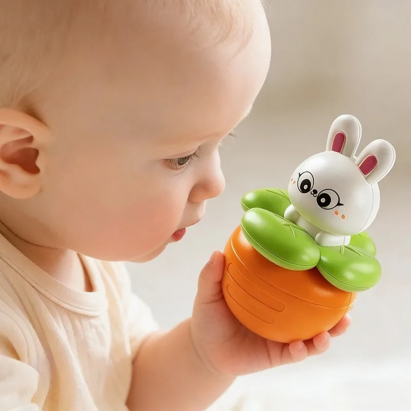 Giocattolo altalena per bambini Simpatico coniglio Carota che suona Giocattolo per l'educazione precoce Materiale sicuro Esercizio Capacità di coordinazione occhio-mano Lenitivo per bambini