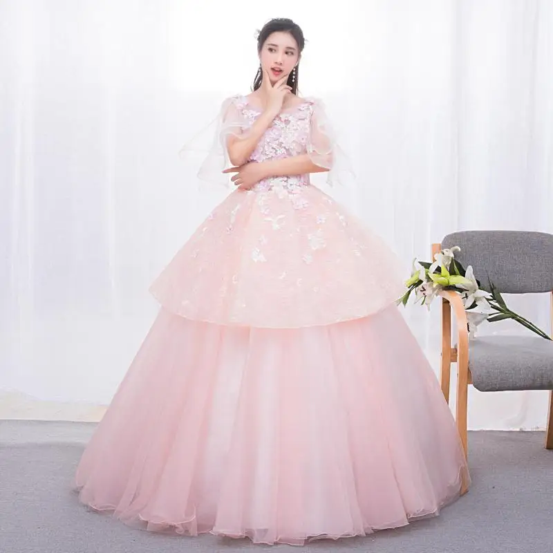 Vestidos de quinceañera de color rosa claro, dulce cuello redondo, Apliques de encaje, vestido de baile con flores, moda para mujer, Suknia Balowa escalonado personalizado