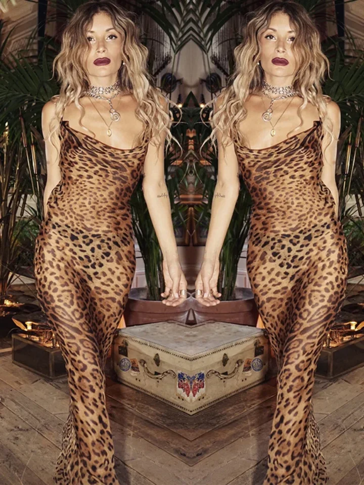 ชุดเดรสยาวลายเสือดาวสำหรับฤดูร้อน แบบซีทรู เซ็กซี่ เปิดหลัง ผ้าบางเบา เหมาะสำหรับใส่ไปทะเล แต่งเชือกผูก ดีไซน์หรูหรา ยาวกรอมพื้น เหมาะสำหรับวันหยุด